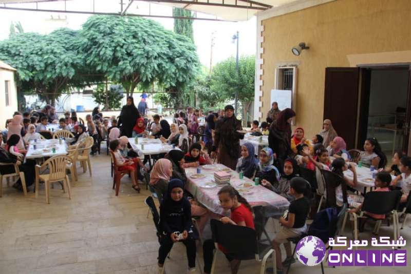 وليمة غذاء يقيمها مكتب شؤون المراة في شعبة معركه لتلاميذ مدرسة القرآن الكريم