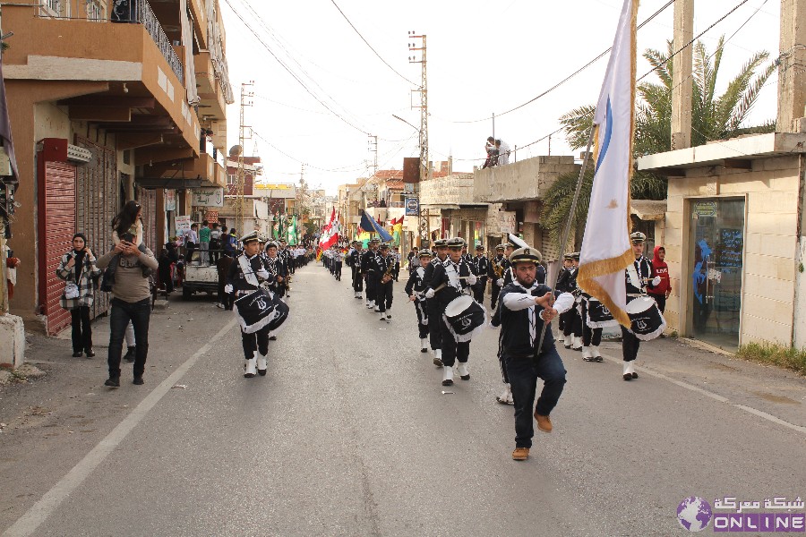 بالصور:في يوم الوفاء للقادة الش☀️داء،  كشافة الرسالة الاسلامية/ الفوج الحسيني الاول تحيي ذكرى تفجير حسينية بلدة معركة بمسيرة كشفية في البلدة.