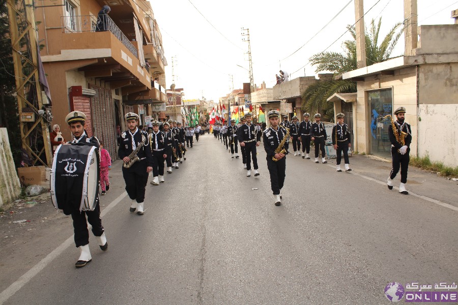 بالصور:في يوم الوفاء للقادة الش☀️داء،  كشافة الرسالة الاسلامية/ الفوج الحسيني الاول تحيي ذكرى تفجير حسينية بلدة معركة بمسيرة كشفية في البلدة.