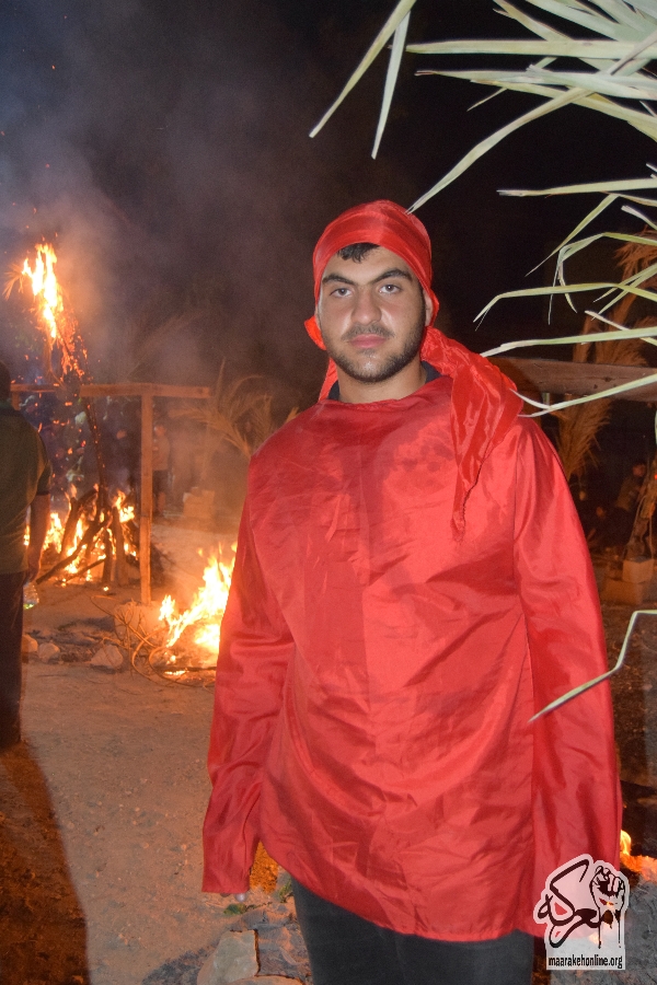 بالصور:تجسيد واقعة حرق الخيام في مضيف  سيد الش:☀️داء(ع) في ساحة بلدة معركة