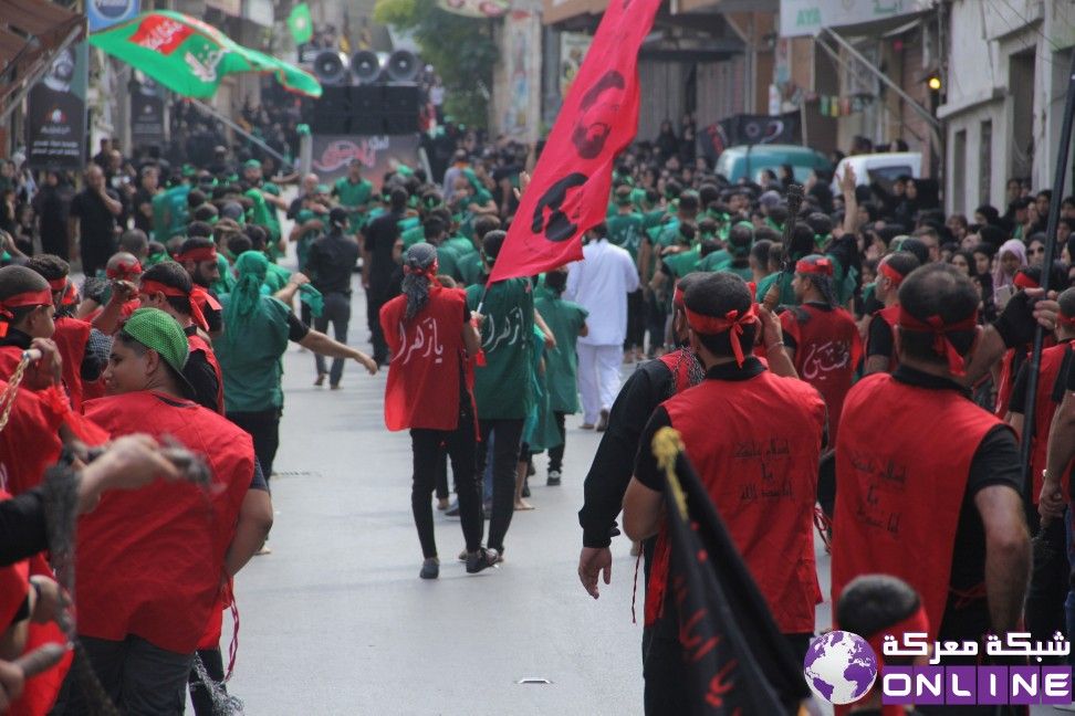 بالصور: مسيرة حسينية حاشدة لحركة أمل في معركة بمناسبة العاشر من محرم