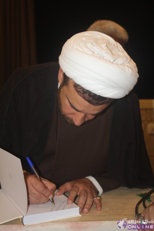 بالصور:حفل توقيع كتاب(القول الفصل في مهدي العصر) للمؤلف سماحة الشيخ علي أحمد طراد في معركة -
